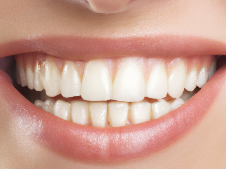 A person gently brushing their teeth in a well-lit home bathroom with a soft-bristled toothbrush.